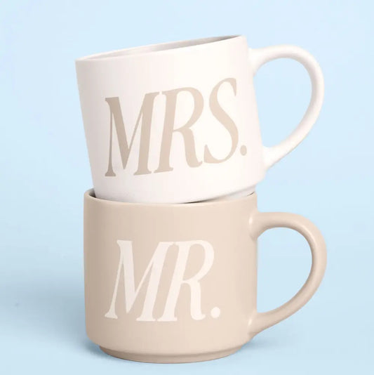 Mr. and Mrs. mug set — cream MRS. mug stacked on tan MR. mug