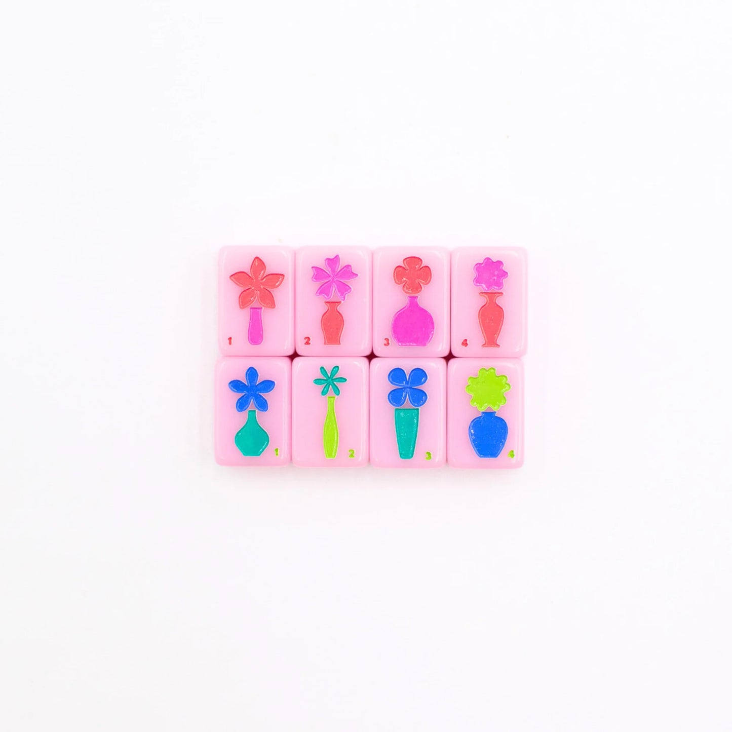 Pink Go Anywhere mini travel mahjong set: eight colorful flower tiles