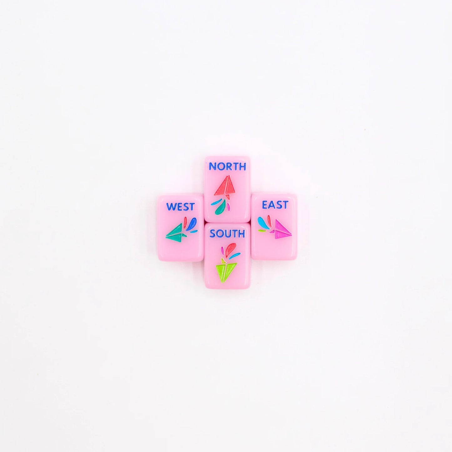 Pink Go Anywhere mini mahjong wind tiles: North, South, East and West with paper-airplane designs