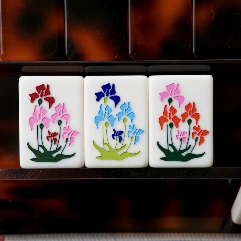 Mod iris flower tiles close-up on a tortoise rack