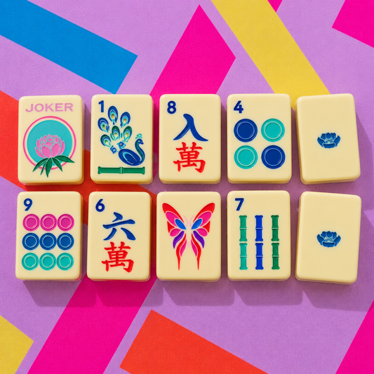Butter Yellow travel mahjong tiles close-up showing joker, peacock bam, craks, dots and butterfly tiles