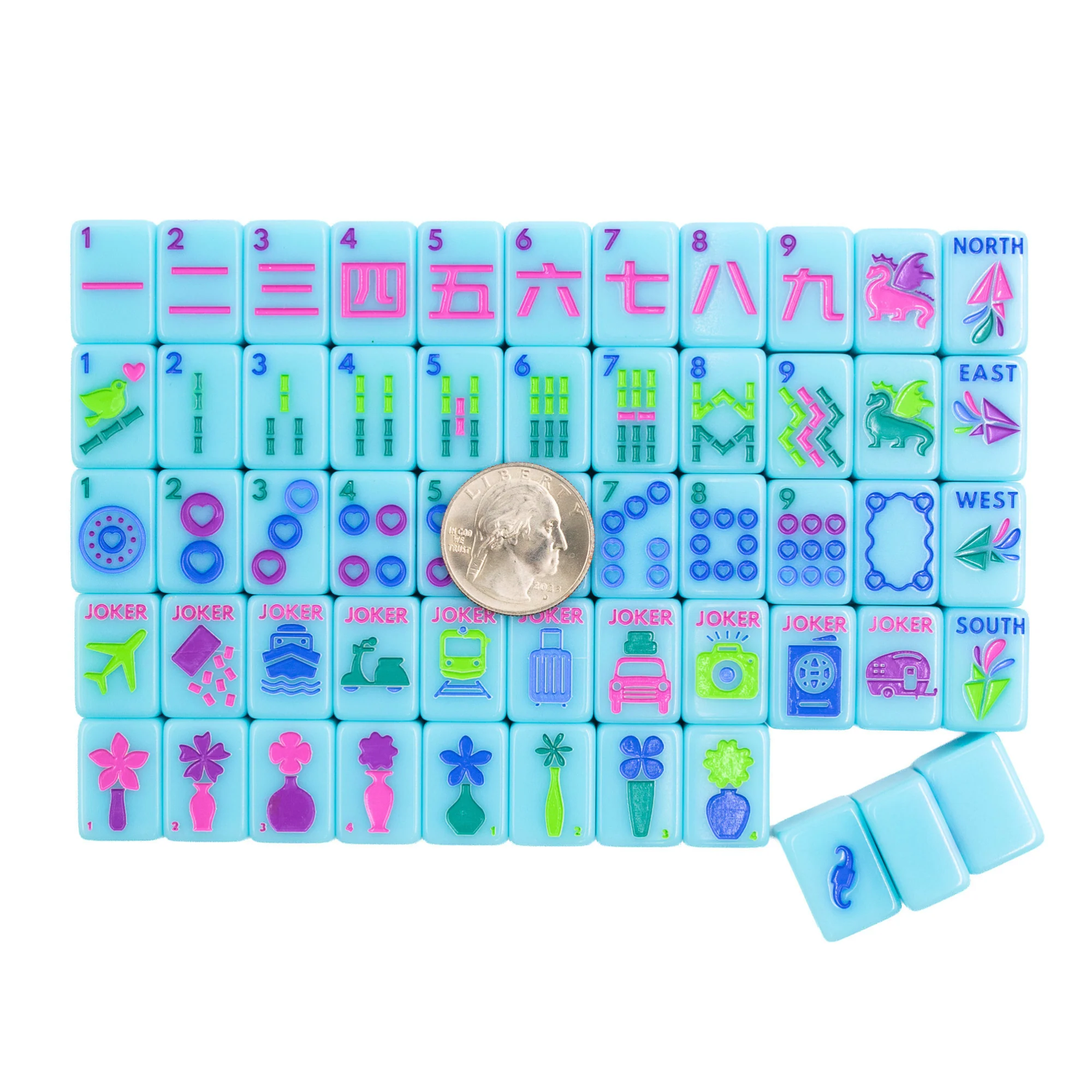 Blue Go Anywhere mini travel mahjong set: full tile layout shown with a quarter for size scale