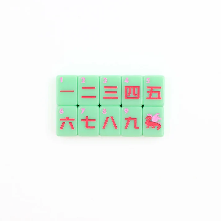 Green Go Anywhere mini mahjong character tiles 1 through 9 with red dragon