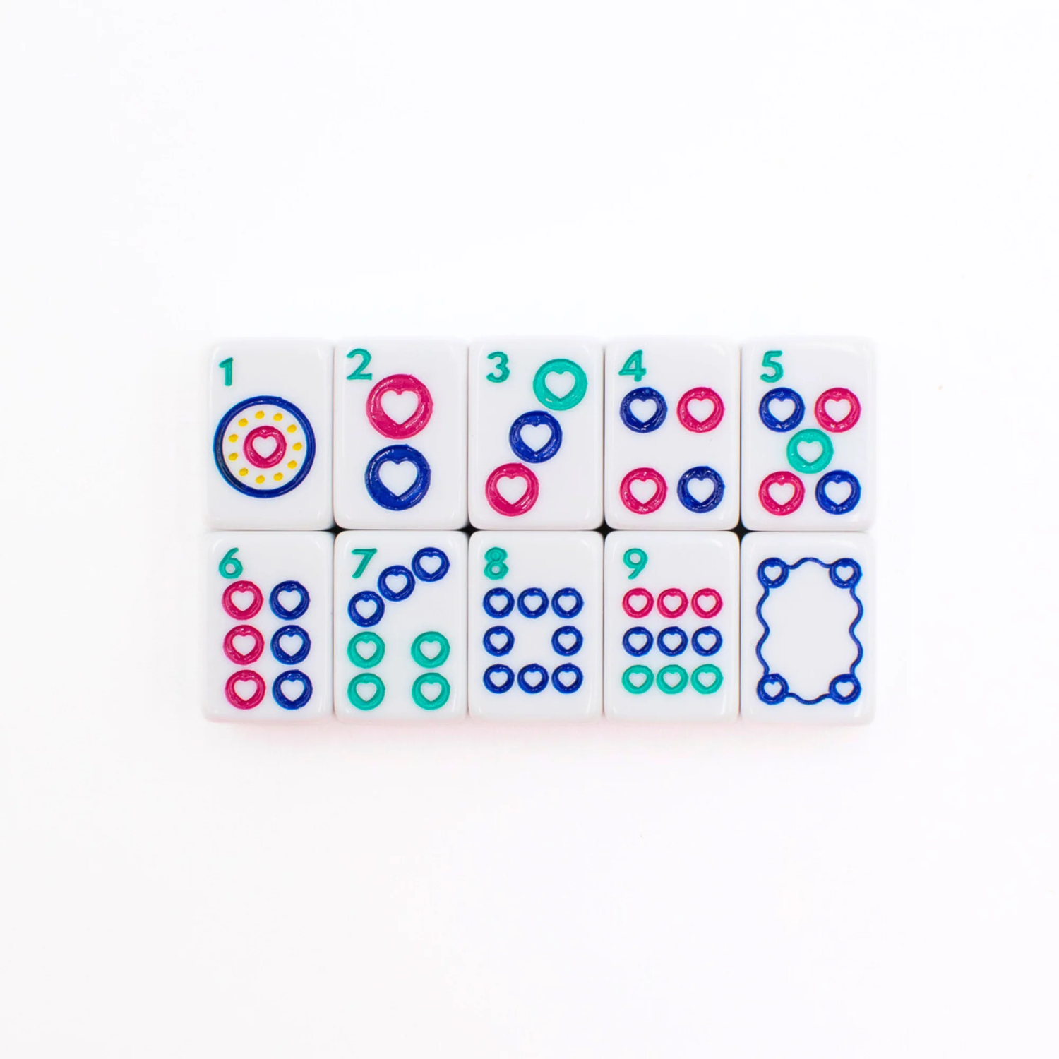 White Go Anywhere mini mahjong dot tiles 1 through 9 with soap tile