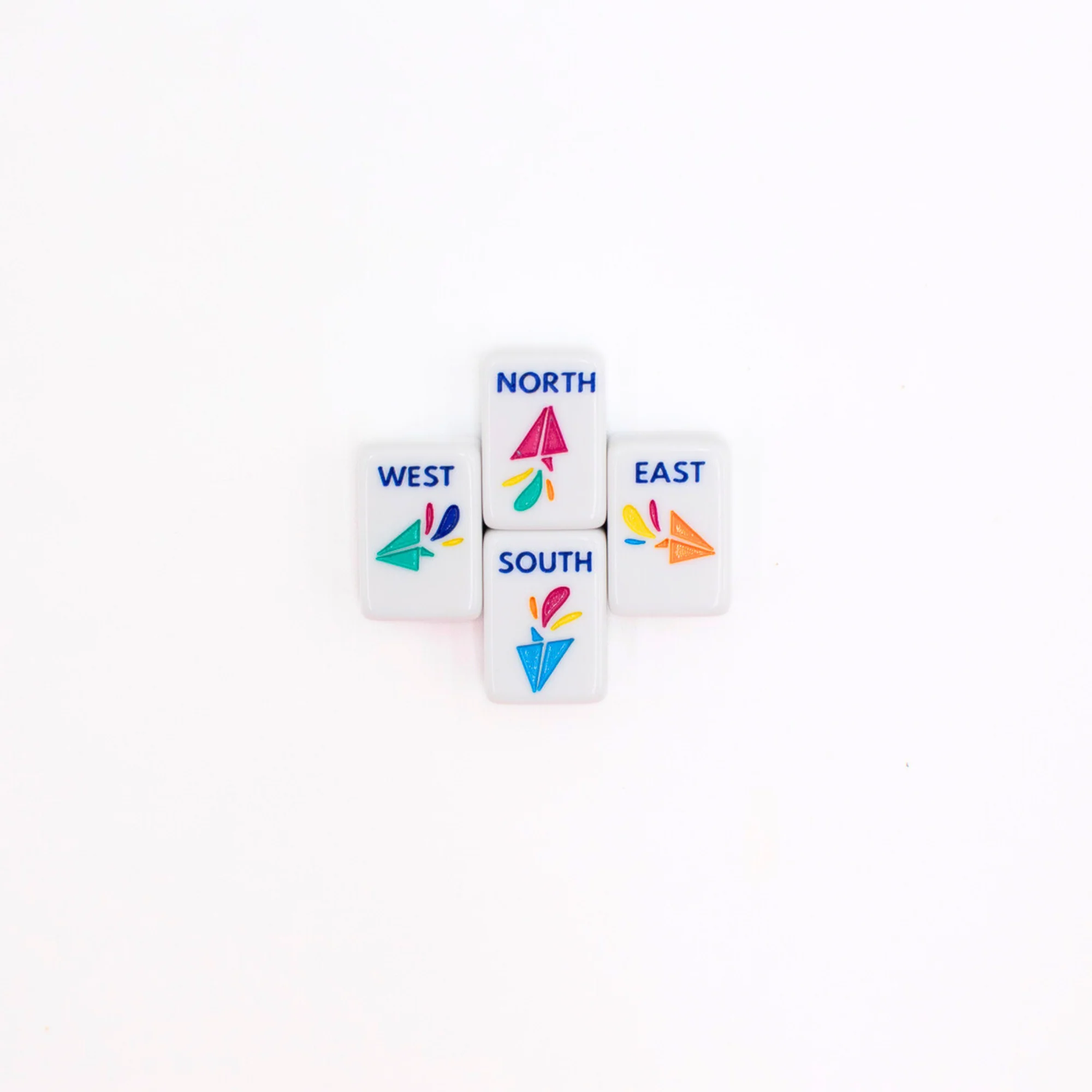 White Go Anywhere mini mahjong wind tiles: North, South, East and West with paper-airplane designs