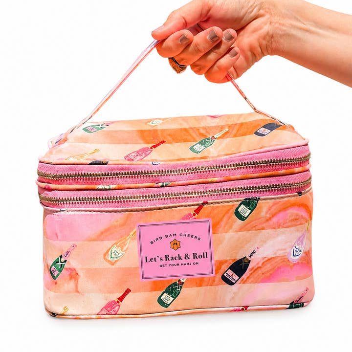 Bams and Bubbly mahjong tile storage case — pink watercolor stripes with champagne bottles and ‘Let’s Rack & Roll’ patch