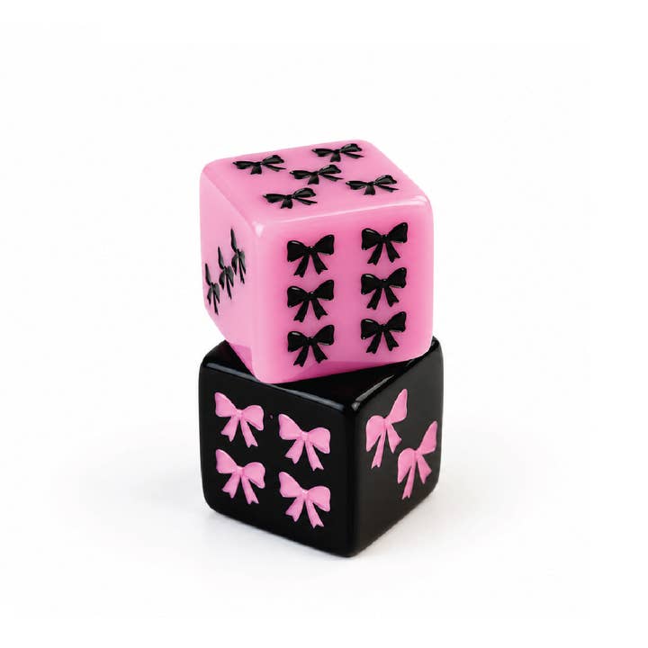 Eau De Mahj mahjong dice stacked — pink bow dice on black bow dice